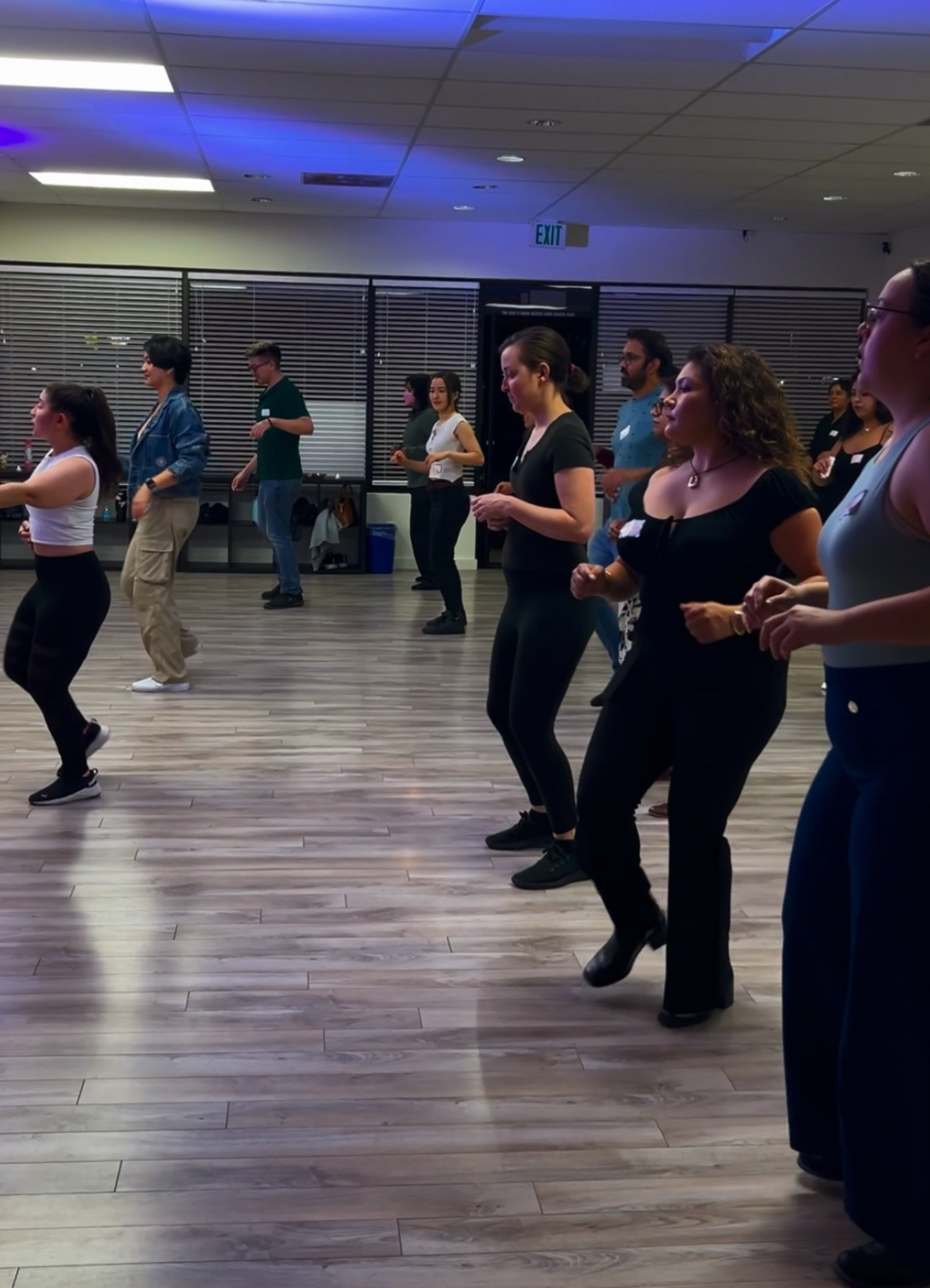 Dancers enjoying a lively salsa performance at a community event