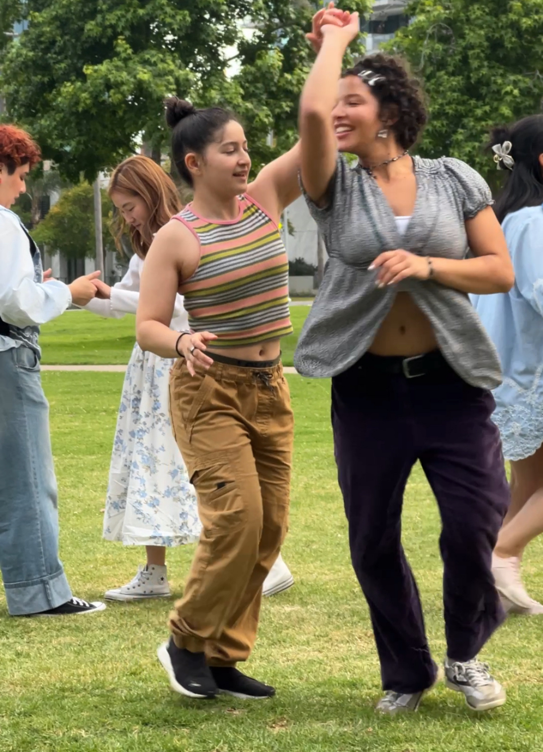 Participants learning salsa moves at Sun Dance Day Fest